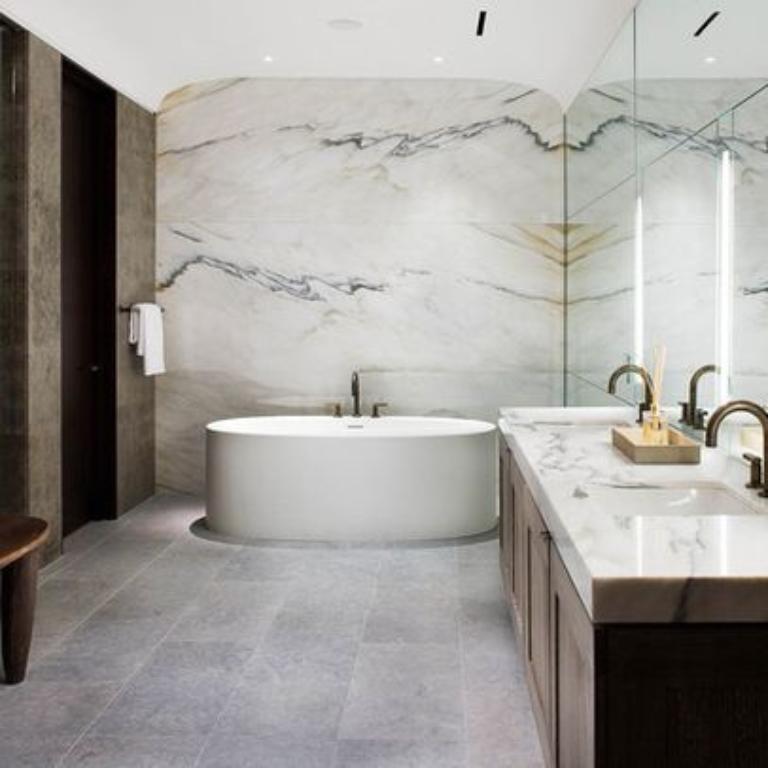 Regular cleaning of marble bathroom floors keeps the bathroom clean and shiny